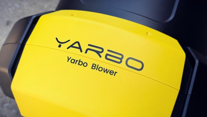 Close-up of the Yarbo Blower module, featuring a yellow and black design with the Yarbo logo and model name prominently displayed.