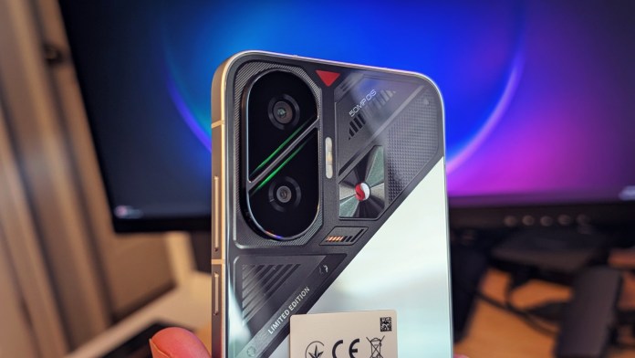 Close-up of the back of the POCO F7 smartphone showcasing its camera module and design elements, including the 50MP label and geometric patterns.