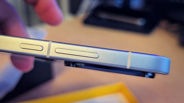 Close-up side view of the POCO F7 smartphone showing the volume buttons and the power button, highlighting the sleek design and aluminum frame.