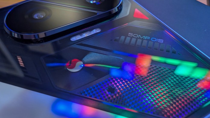 Close-up of the POCO F7 smartphone's back panel showcasing the dual camera setup, including a prominent 50MP OIS lens and colorful reflective elements.