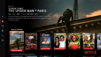Screenshot of Netflix’s TV interface showing horizontally scrolling content shelves with thumbnail images of shows and movies arranged in rows, illustrating a common layout pattern used in TV apps.