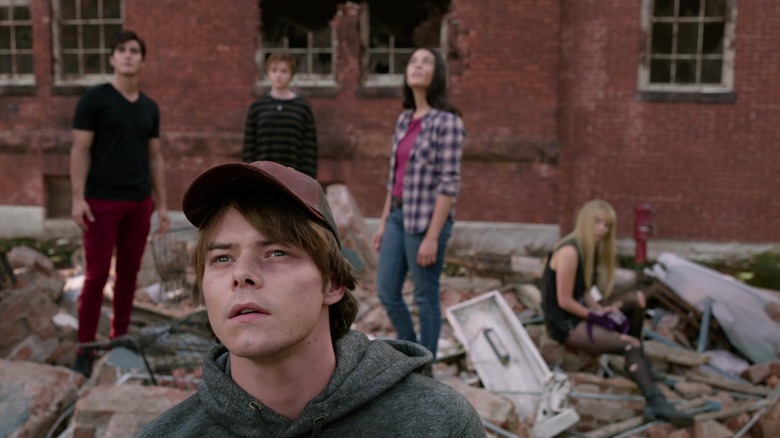The New Mutants emerge from the wreckage of a building in The New Mutants