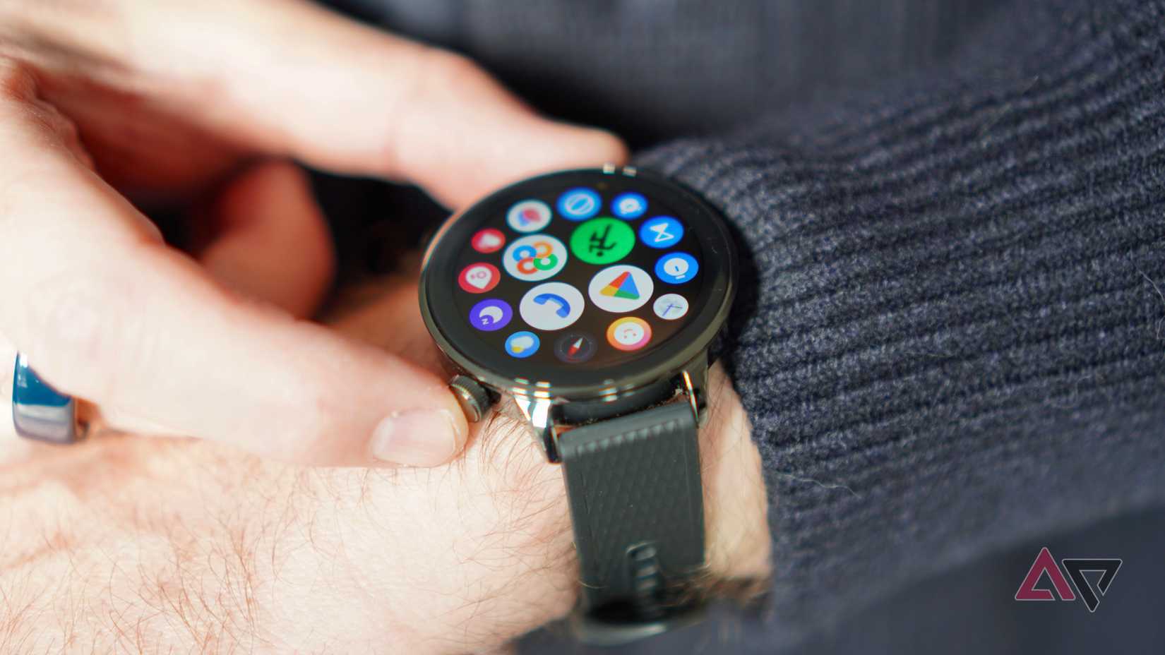 A person using the OnePlus Watch 3 43mm